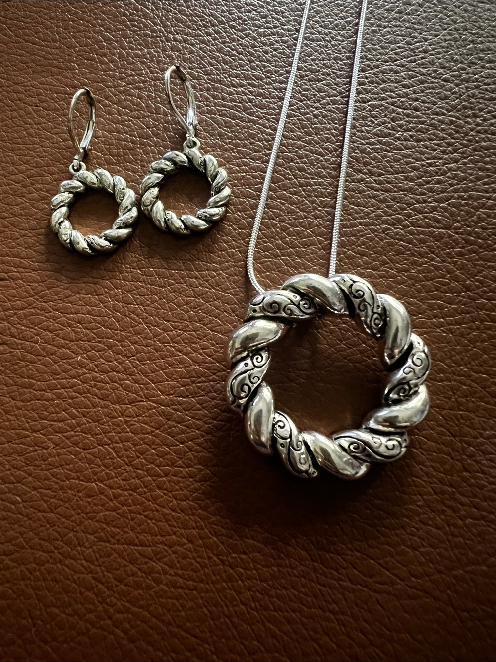 Set of Silver Twisted Pendant and Earrings